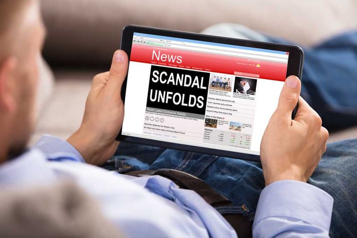 686343781 featured image Person reading tablet with headline Scandal Unfolds.