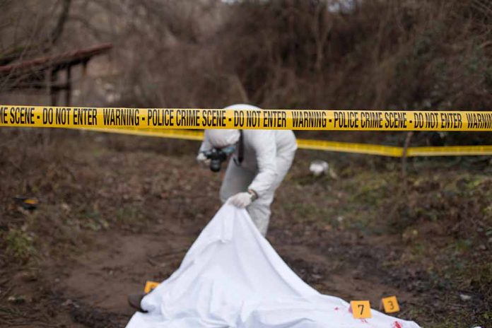 792627700 featured image Crime scene investigator examining area with police tape