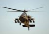 Helicopter in flight viewed from below front
