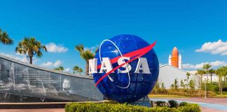 NASA logo sculpture with spaceship and palm trees