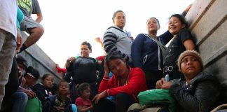 Group of people sitting inside a vehicle