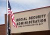 Social Security Administration building with American flag.