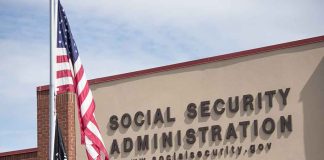 Social Security Administration building with American flag.