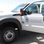 U.S. Customs and Border Protection truck with open door