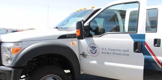 U.S. Customs and Border Protection truck with open door