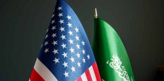 American and Saudi Arabian flags side by side