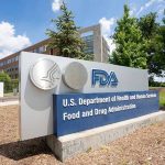 FDA building sign in grassy area outdoors