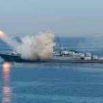 Warship firing missile in the sea