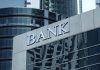 Modern bank building with reflective glass exterior