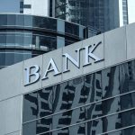 Modern bank building with reflective glass exterior