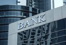 Modern bank building with reflective glass exterior