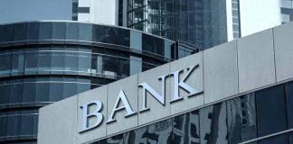 Modern bank building with reflective glass exterior