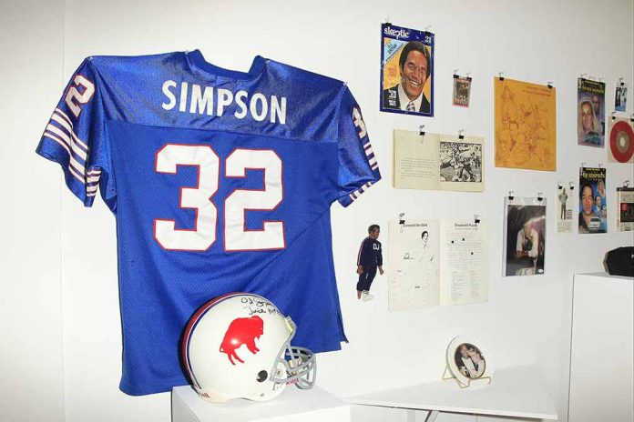 698351506 featured image Blue jersey and helmet displayed with wall memorabilia