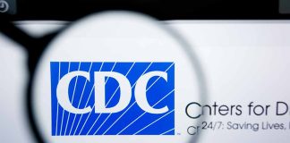 CDC logo magnified on a screen