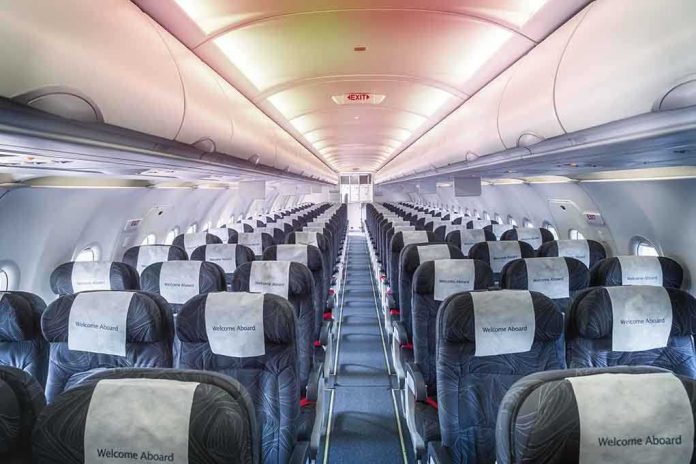 1889559274 featured image Empty airplane cabin with rows of seats