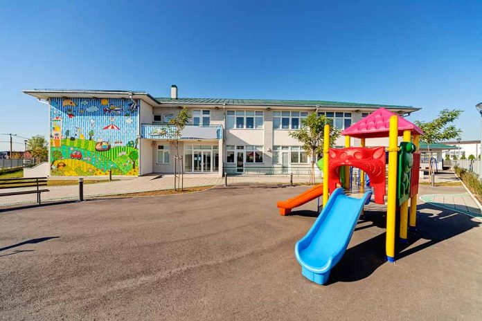 20485255 featured image Colorful playground slide in front of a building