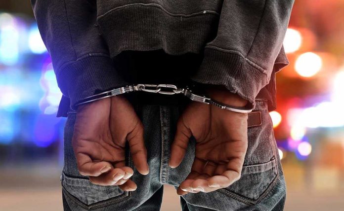 Handling handcuffs and unlocking with a key