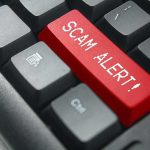 Keyboard with red SCAM ALERT key
