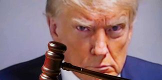 Gavel in front of a serious man's face
