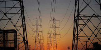 Transmission towers at sunset