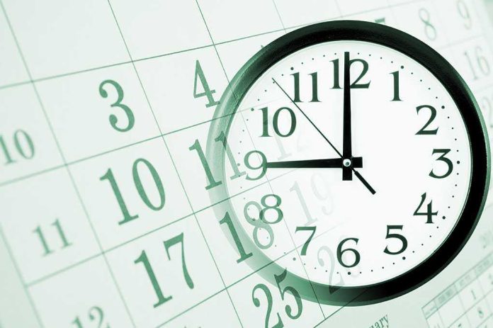 shutterstock_173563493.jpg A clock overlaying a calendar illustrating the concept of time management