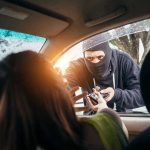 TV Star Robbed in Beverly Hills! Masked person robbing a woman inside a car.