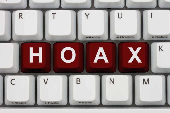 Close-up of a computer keyboard with the word 'HOAX' spelled out in red keys