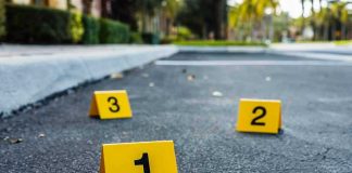 Crime scene markers on asphalt