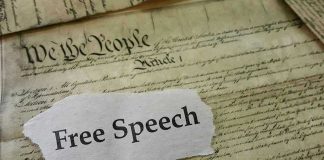 Old document with text Free Speech overlay