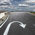Gen Z’s Surprising Religious U-Turn Curved road with a U-turn arrow marking.