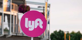 Lyft ride-sharing sign in a city environment