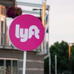 Lyft ride-sharing sign in a city environment