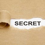 ICE Murder Plot EXPOSED — Perp Finally REVEALED! A torn piece of brown paper revealing the word SECRET underneath