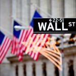 MASSIVE Gold Surge As Government COLLAPSES! Wall Street sign with American flags in the background