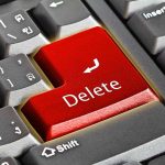 Close-up of a keyboard with red Delete key.
