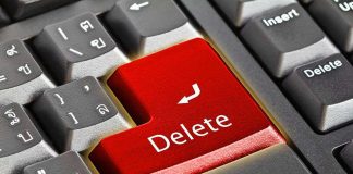 Close-up of a keyboard with red Delete key.
