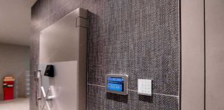 Keypad and touch screen beside secure stainless steel door