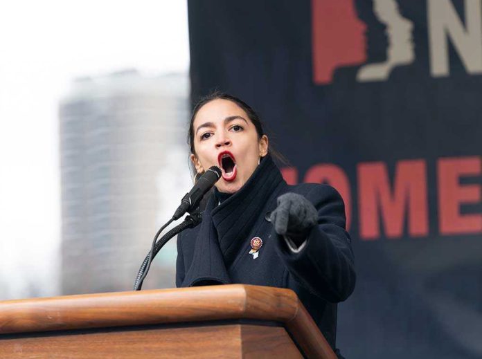 Woman speaking passionately at podium during outdoor event.