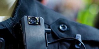 Body camera attached to a black uniform.
