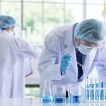Hollywood Push for Dewormers: Cancer Patients Flock! Scientists working in a laboratory with test tubes