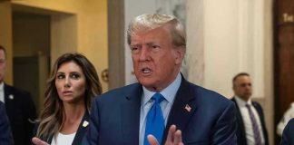 Texas GOP SHOCKER: Trump Ally Topples Cornyn! Man speaking with hands raised, woman and security behind.