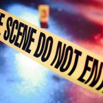 Crime scene tape with do not enter text.
