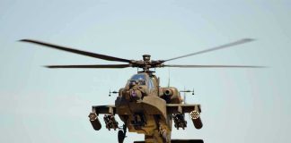 Apache Down Near Iran—Mystery Deepens Military Apache helicopter flying in the sky