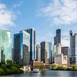 Bears Bolt? Indiana Deal Accelerates Chicago skyline featuring modern skyscrapers along a river