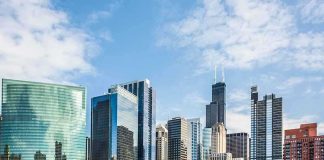 Bears Bolt? Indiana Deal Accelerates Chicago skyline featuring modern skyscrapers along a river