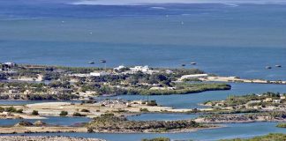 Aerial view of a coastal landscape featuring waterways and islands