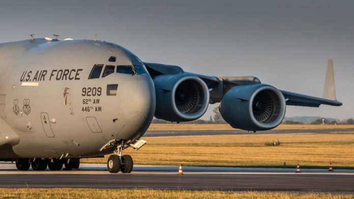 U.S. Air Force cargo plane taxiing on runway