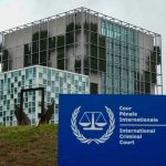 Arrest Showdown: Netanyahu Dares New York International Criminal Court building with sign in foreground.