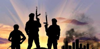 DOJ Drops Explosive Crypto-Terror Case Three armed silhouettes near a smoky city skyline.