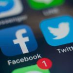 Under-15 BAN — The Catch Snags Adults Too Smartphone screen showing social media app icons